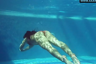 Kittina swims naked in the swimming pool 5 min