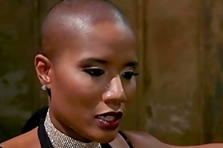 Shaved head ebony torments male slave